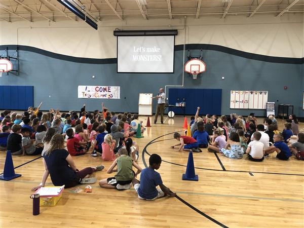 Author Troy Cummings giving a presentation to students