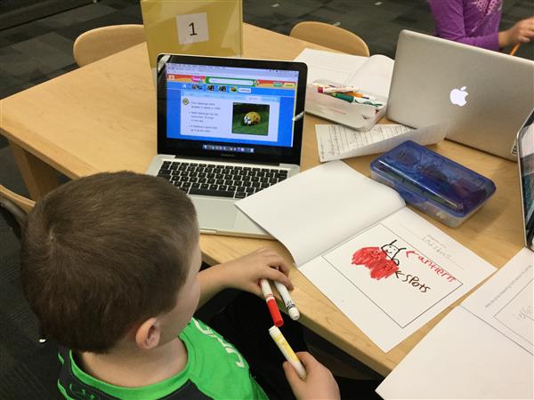 Students researching animals on computers